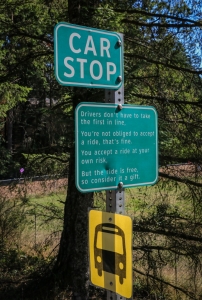 Car stop sign with bus stop sign, Pender Island BC
